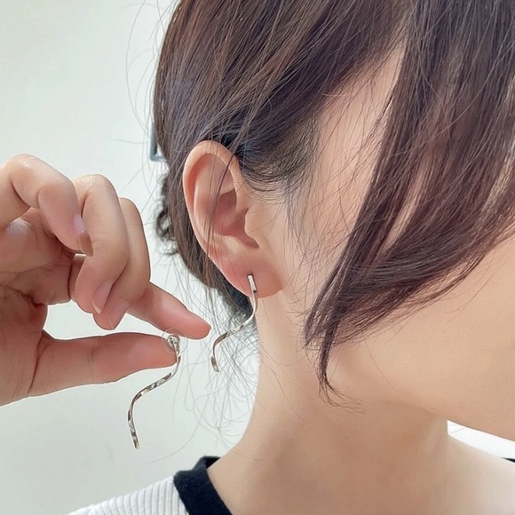 Any 2/$20! Silver Drop Swirl Stud Earrings - Picture 2 of 8